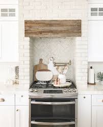 Kitchen Brick Hood And Kitchen Brick Backsplash Using Distressed Painted Brick In Kitchens Is A T Interior Design Kitchen White Brick Backsplash Brick Kitchen