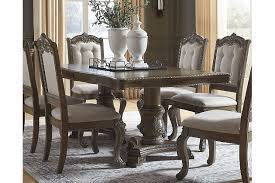 Skempton counter height dining room table and bar stools. Charmond Extendable Dining Table Ashley Furniture Homestore