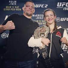 Champion Miesha Tate And Nate Diaz Biggest Winners Of Ufc 196 Mma Women Ufc Clothing Ufc Fighters