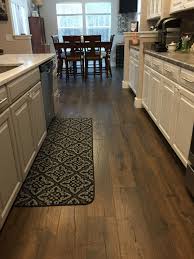 After the install, the floors are solid, smooth and even. Pergo Outlast Vintage Tobacco Oak Wood Floor Kitchen Pergo Flooring House Flooring