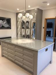 This Dressing Room Has A Large Centre Island Painted In Farrow And Ball Worsted Modern Kitchen Design Kitchen Design Modern White White Kitchen Rustic