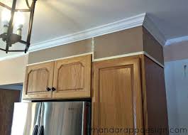 Our diy kitchen soffit makeover.our goal was to disguise the kitchen soffit (the part of the ceiling over the cabinets; Amanda Rapp Design Add Height To Existing Cabinets Kitchen Cabinets To Ceiling Kitchen Soffit Cabinet