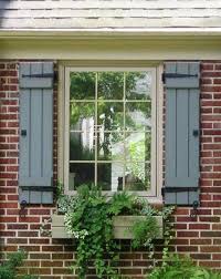 Exterior solutions offers both standard and custom size louver, raised panel, and board and batten exterior vinyl shutters. Board And Batten Shutters Shutters Exterior Shutters Brick House Wood Shutters Exterior