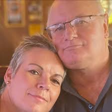 An off-duty police officer has been revealed as the commuter who headbutted  a man who had allegedly been fighting and making violent threats