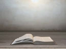 Silhouette of christian young woman praying with a cross and open the bible at sunrise, christian religion concept background. Living Bible Motion Background Sermon Gear Worshiphouse Media