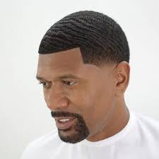 Coupe de cheveux homme noir. Mid Fade Half Novocom Top