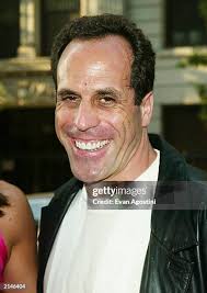 Actor Saul Stein and friend Isabella arrive at the New York premiere...  News Photo