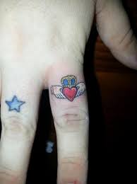 Claddagh Ring By Sparx In La Crosse Wi Claddagh Ring Tattoo Ring Finger Tattoos Claddagh Tattoo