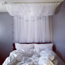 I simply love this diy idea for displaying all the random but beautiful pots and plants i have on the ground. Diy Canopy 2 Curtain Rods And 2 Sets Of Lill Sheer Curtains All From Ikea Mount One Rod On The Ceiling And The Other Bedroom Diy Bed Canopy Bed Curtains