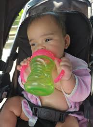 How to teach utensil usage to a 7-month-old baby?