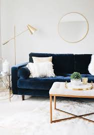 Modern Simplicity Navy Velvet Sofa In White Room With Gold Accents Living Room Decor Neutral Blue Living Room Mid Century Modern Living Room