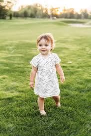 Cute toddler going about her daily routine. A Day In The Countryside Little Cute Toddler Girl Barefoot In Stock Photo Picture And Royalty Free Image Image 140424211