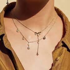 The Moroccan Dangle Charm Necklace Gold In 2021 Charm Necklace Silver Gold Charm Necklace Moroccan Jewelry