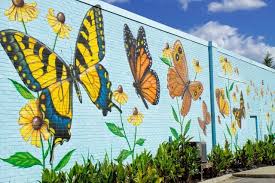 Lovely Butterfly Mural By Artist Chip Wilkinson In South Norfolk On The Outside Wall Of The Portlock Galleries Garden Mural Murals Street Art Fence Art