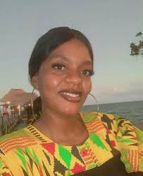 Jude Belize Foundation President Elda Conorquie Congratulates Garifuna  Culinary Instructor