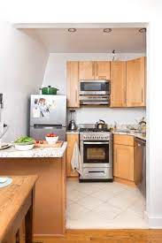 See How A Family Of 4 Lives In This 500 Square Foot Apartment Small Space Kitchen Small Kitchen Layouts Tiny House Living