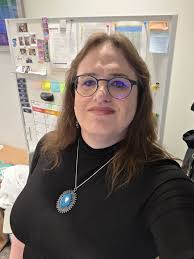 Hi all! I just wanted to introduce myself and share a photo I took this is  me and my family and one of my favorite games.