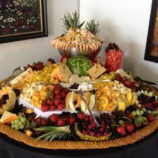 What is the difference between a formal and an informal table setting? Wedding Fruit And Cheese Table Yummy Yummy Pinterest Food Displays Fruit Buffet Appetizer Display