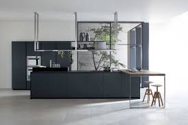 Wooden countertop, steel stove, board,knife and spices. Grey Modern Kitchen Designs