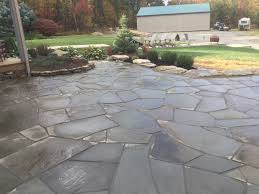 Stones come in various shades of gray which may have tints of blue (bluestone), green, tan, brown, rust, and plum mixed with the gray. Gilliland Landscape Flagstone Patios Walkways