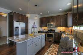 Dark Stained Maple Cabinets In Custom Kitchen With Grey Painted Island And Two Diff Maple Kitchen Cabinets Custom Kitchen Cabinets Kitchen Cabinets And Granite