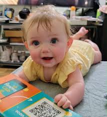 This is a photo of my great niece. I wonder if any of you talented people  out there can make this look like a photo shoot. I'd like to give this to