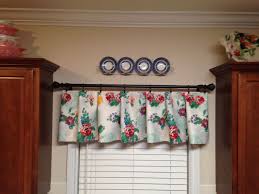Browse through the best designs for 2021 and kitchen cabinet curtains are an absolutely adorable way to add personality and charm to your to bring this idea home, just select a fabric, curtain rod and hangers that go with your decor. Pioneer Woman Tablecloth Turned Into A Valance Pioneer Woman Kitchen Pioneer Woman Kitchen Decor Farmhouse Style Kitchen Curtains