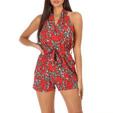 Modèle avec encolure en v plongeante devant et dans le dos, surmontée d'une lanière horizontale sur la nuque. Combi Short Rouge A Motif Coquelicot