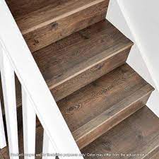 Can luxury vinyl be installed on the stairs? Pergo Java Scraped Oak 75 In Thick X 2 36 In Wide X 78 7 In Length Laminate Stairnose Molding Mg001876 The Home Depot