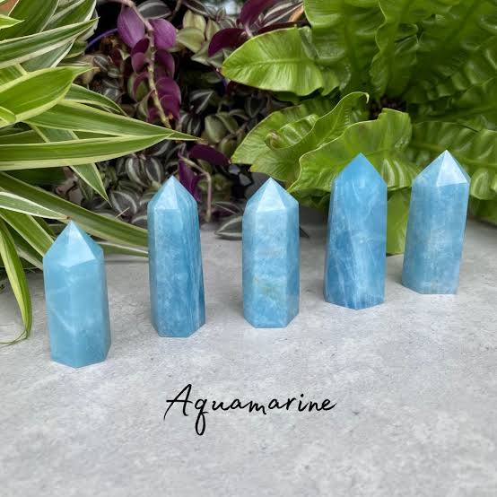 Polished Aquamarine Crystal Towers, AI generated