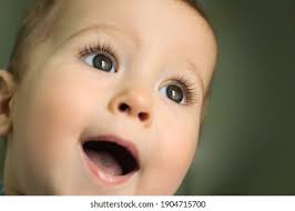 Kid Smiles Surprised Child Joy Close-up Stock Photo 1904715700