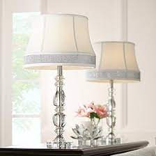 Highlights mini lamp has a clear crystal base and neutral pinstriped shade for versatility with a wide range of decorating styles. Crystal Bedroom Lamps Plus