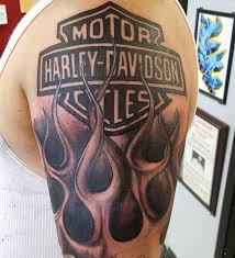 Spine one made grey tattoo. Added The Harley Davidson Logo And Restored The Flames Klockwork Tattoo Club Klockworktattooclub Klockwork Hare Harley Tattoos Tattoos Arm Tattoos For Guys