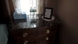 Choosing two nightstands of the same material is a great option, and wood is an especially great material to play with for this approach. One Of Two Nightstands Notice The Wifi Info In The Picture Frame Picture Of Black Swan Inn Bed And Breakfast Tilton Tripadvisor