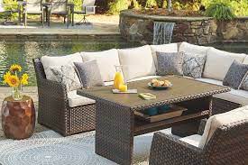 Easy Isle Sofa Sectional Chair With Cushion Set Of 3 Ashley Furniture Homestore Patio Sectional Patio Furniture Layout Resin Patio Furniture