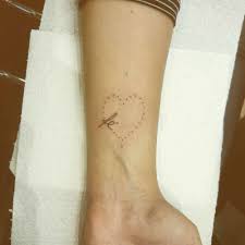 Using initials in a heartbeat tattoo is a great way to represent love. 21 Lovely Heart Tattoos