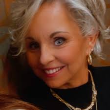 Pictured below is Deputy James Leubner, Property Crimes, and Deputy Beth  McGee, Violent Crimes, who are being congratulated by Sheriff Tony Mancuso  after they were both recently promoted to Lieutenants in the