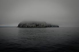 Grayscale photo of island on sea photo – Free Grey Image on Unsplash