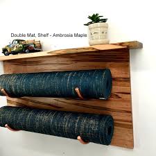 By doing that, you will also make your home clean and tidy. Yoga Mat Rack Gym Mat Storage Yoga Mat Holder With Shelf Etsy In 2021 Yoga Mat Storage Yoga Mat Holder Home Yoga Room