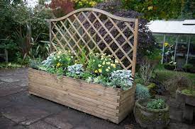Elegant and classic, this red barrel studio® calypso square planter with trellis is ideal to grow your fondest plants that may require a support frame. Venice Planter Forest Garden