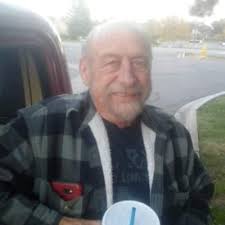 Who can build a structure for trash barrels in Arvada by the end of July?