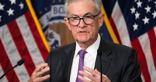 Powell signals Fed will raise rates if needed, keep them high