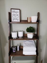 Having a basket is one of the best small bathroom storage ideas for over the toilet because it's compact, discrete, and it works. 20 Over The Toilet Storage Ideas For Small Bathrooms
