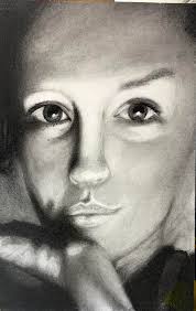 2 charcoal and watercolour portraits and 1 charcoal portrait of the same  Whippet!