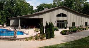 How much does a metal building home cost? 7 Ways To Make A Metal Building Look Like Home Go Barndo Barn House Design Barn Style House Metal Buildings
