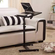 Sofa beds are ideal for those who are short on space but still want to provide adequate room for guests to sleep. Laptop Table For Couch You Ll Love In 2021 Visualhunt