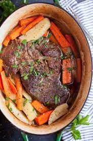 Rub the beef with the rapeseed oil and season all over with salt and pepper. Dutch Oven Pot Roast With Carrots And Potatoes Feast And Farm