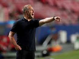 Flick, kimmich, alaba and gnabry sitting in the middle of the pitch with the lights out after winning the champions league. Hansi Flick Urges Bayern Munich To Stay Grounded After Champions League Demolition Of Barcelona The Independent The Independent