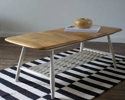 Classic moldings and plenty of shelf space make this coffee table a smart choice for transitional interiors. We Love Vintage Ercol Coffee Table From Britain With Love
