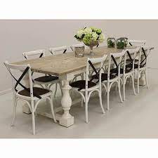 At home in a modern farmhouse or elegant country cottage, this set of two dining chairs is the perfect addition to your favorite room. White Wash Colonial French Style Table With White Metal Cross Back Cafe Chairs Classic Combination Dining Table Furniture Nz Lifestyle Furniture